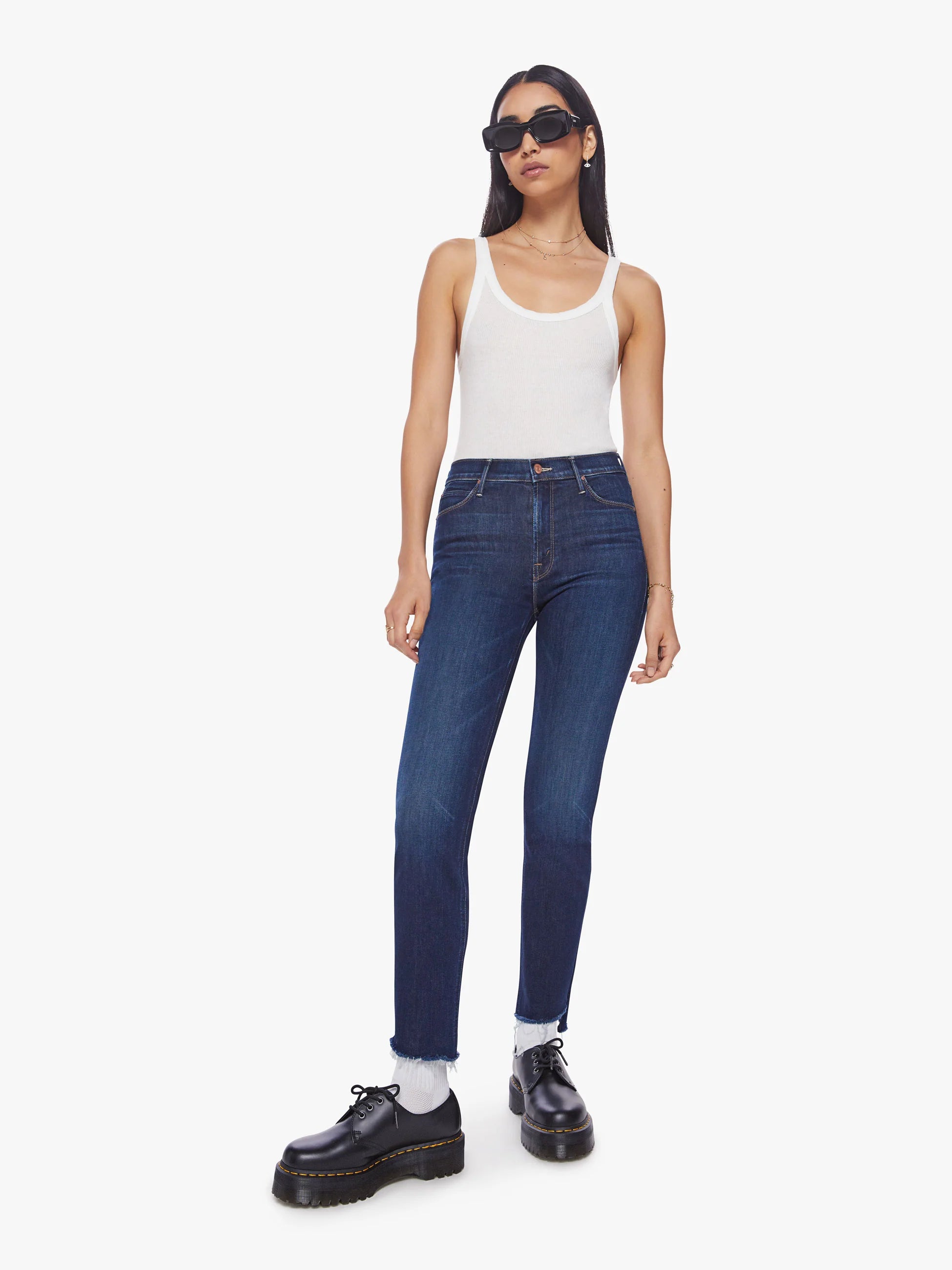 Out of bounds. Our most popular mid-rise jean has a straight leg with an ankle-length inseam and a frayed step hem. Made from stretch denim, Off Limits is a dark-blue wash with subtle fading and whiskering. Mid Rise Dazzler