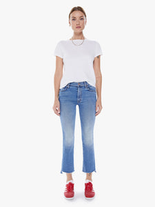Squeeze the day. This iconic high-waisted bootcut is cropped at the ankle with a frayed step-hem. Cut from stretch denim, Juicin' is a mid-blue wash with whiskering and fading throughout.