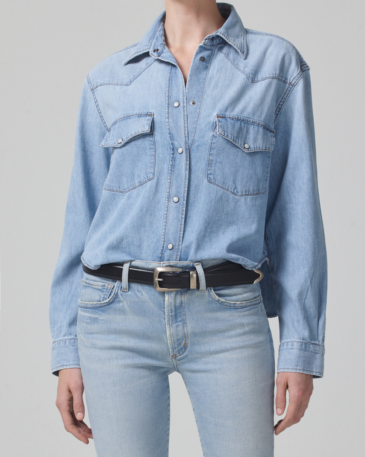 Featuring all the traditional Western style details - two chest pockets, front yoke, and a snap-front closure and crafted in our rigid, but breathable Japanese Denim Shirting, we updated the classic silhouette to have a cropped body, making it the perfect piece to pair back to high waist denim for a whole denim-on-denim look.