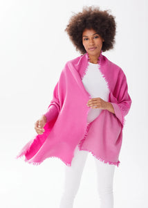 The coziest wardrobe essential. Oversized and incredibly soft, our double-face cashmere wrap is the perfect year-round accessory. Make it a statement piece by draping it over a neutral outfit or wear it as a luxurious scarf or wrap for another layer of warmth. Delicate fringe along all of the edges provides the perfect feminine finish.
