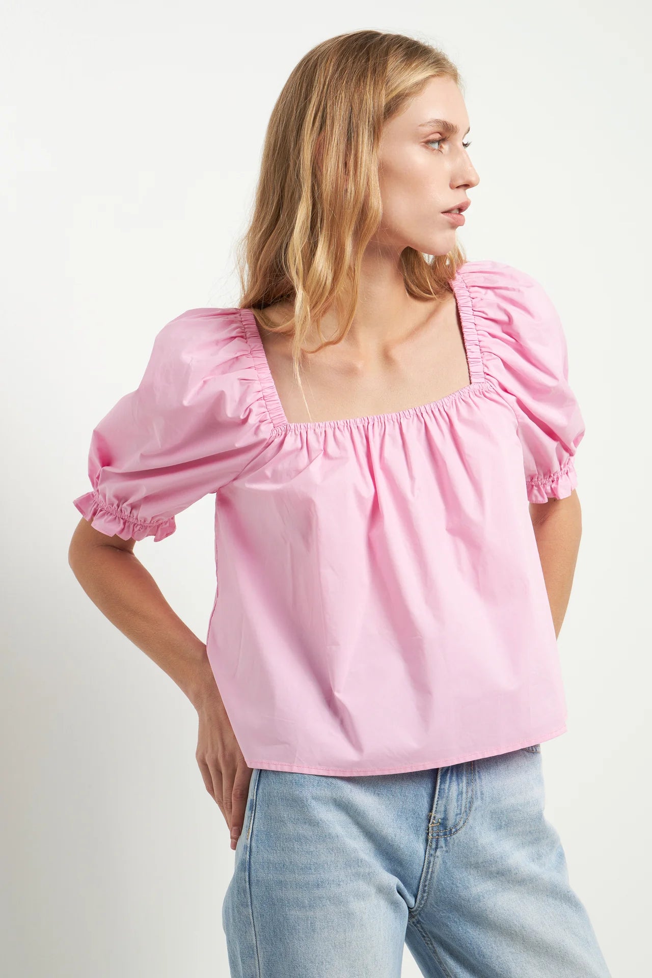 This cute and trendy square neckline Puff Sleeve Top is perfect for any season! The puff sleeves are elastic and cropped giving you a stylish and comfortable look. The square neckline is flattering and fashionable and the top is sure to become one of your favorite go-to tops!